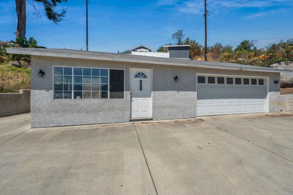 1308 Sundale Road El Cajon, CA 92019 - Photo 62 of 70 front view of a house with a outdoor space