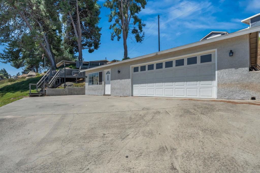 1308 Sundale Road El Cajon, CA 92019 - Photo 63 of 70 a view of a house with a garage