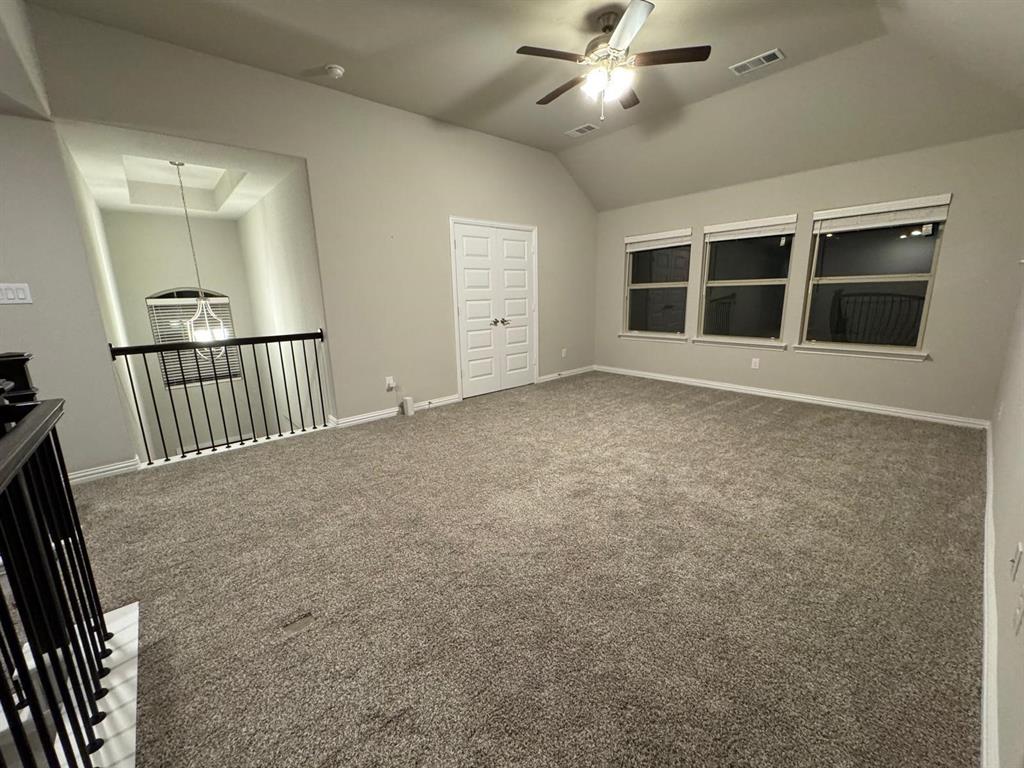 1204 Sundrop Drive Little Elm, TX 75068 - Photo 16 of 24 a view of an empty room with a window