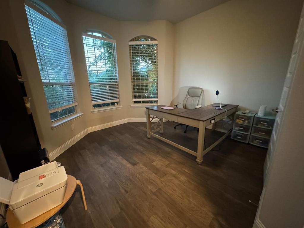 1204 Sundrop Drive Little Elm, TX 75068 - Photo 3 of 24 a view of a workspace with furniture and a window