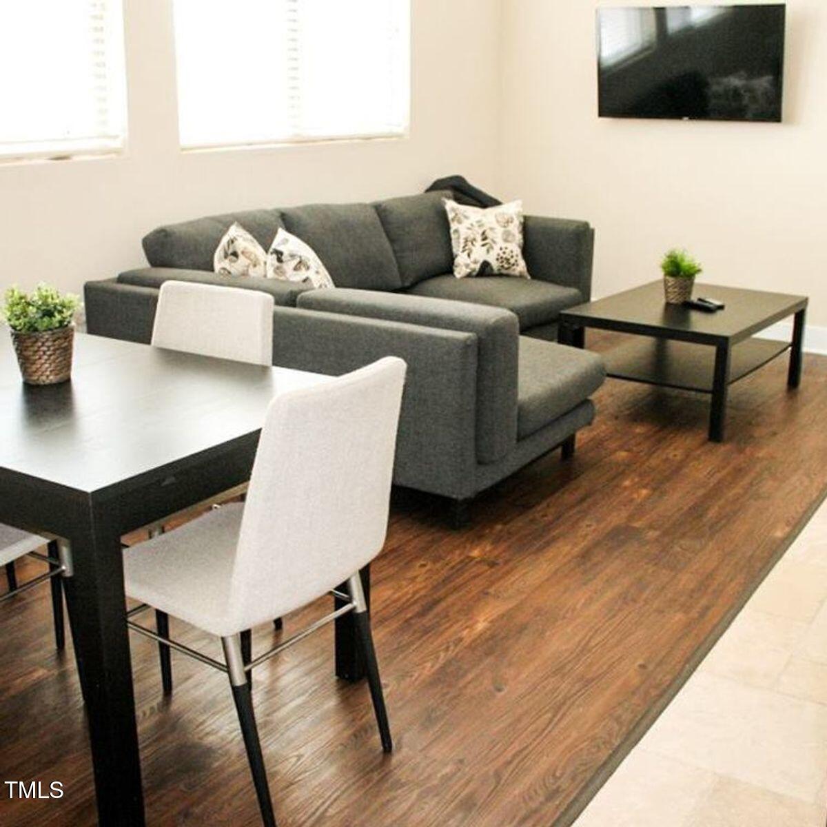 105 Friendly Drive, Unit 504 Raleigh, NC 27607 - Photo 4 of 4 large-1738339450954-LIVINGROOM COMMON AR