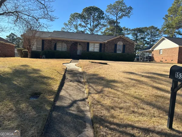 a view of house with outdoor space
