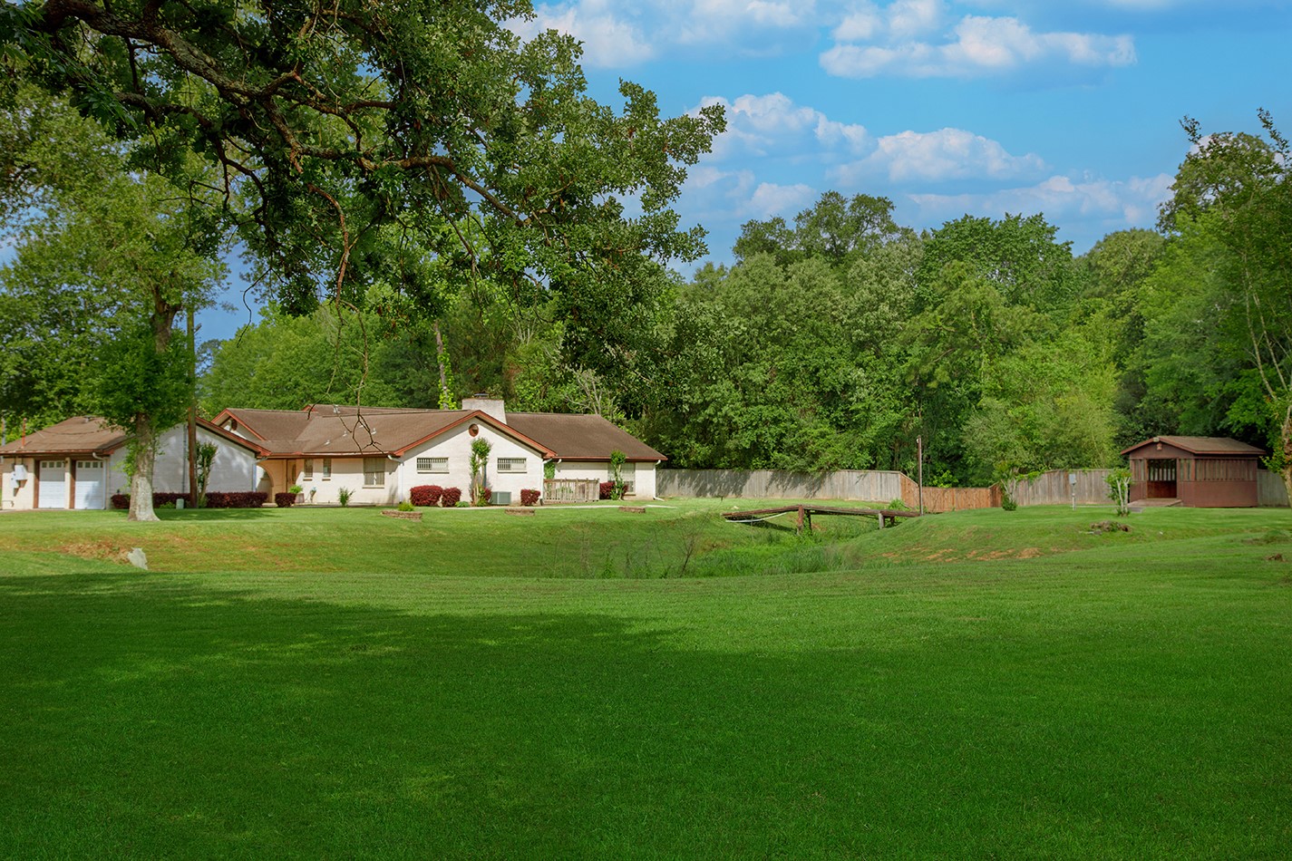 23218 Aldine Westfield Road Spring, TX 77373 - Photo 37 of 47 a front view of a house with a yard and trees
