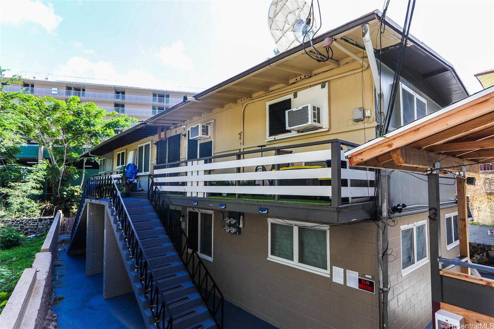 1641 Stillman Lane Honolulu, HI 96817 - Photo 14 of 25 a view of a house with a deck and furniture