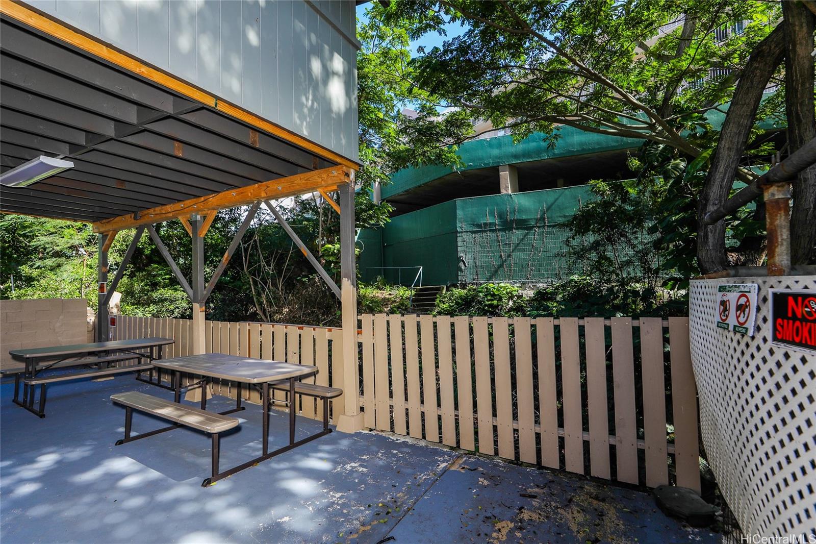 1641 Stillman Lane Honolulu, HI 96817 - Photo 21 of 25 a view of backyard with a deck and wooden fence
