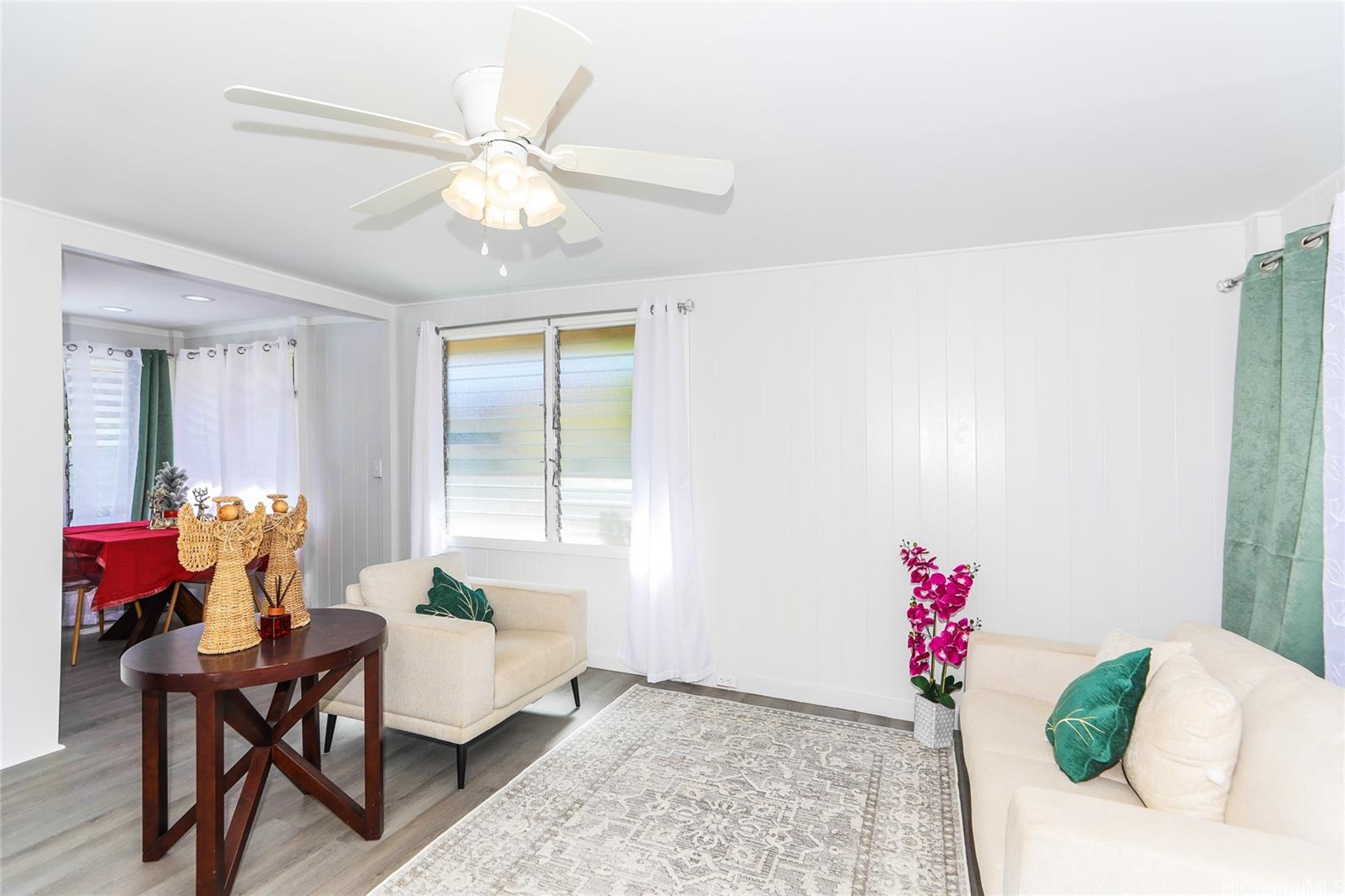 1641 Stillman Lane Honolulu, HI 96817 - Photo 4 of 25 a living room with furniture and a chandelier