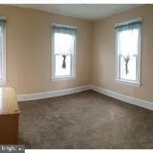 a kitchen with a sink and a stove