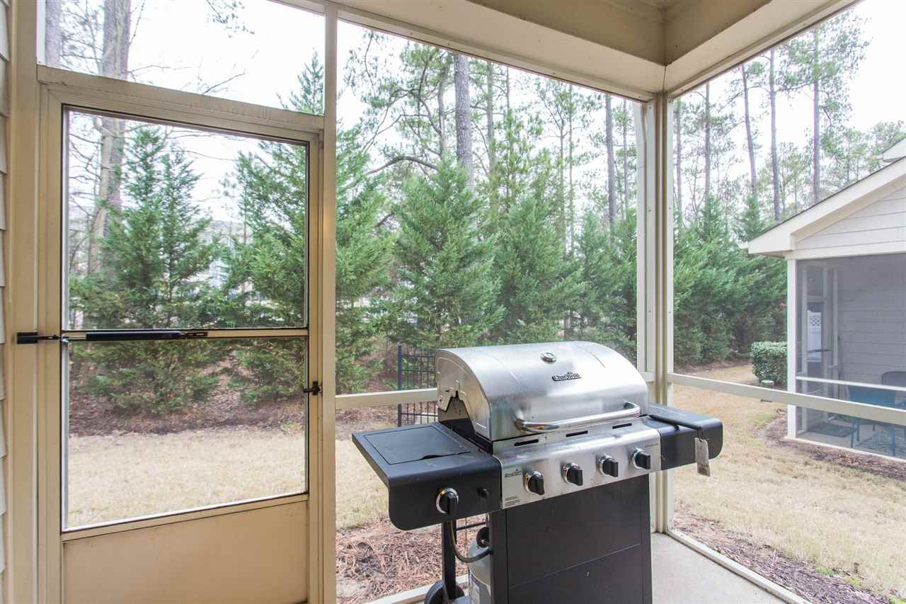 9929 Lynnberry Place Raleigh, NC 27617 - Photo 4 of 30 A lovely view from inside the screened-in porch/patio. Screen Porch/Patio