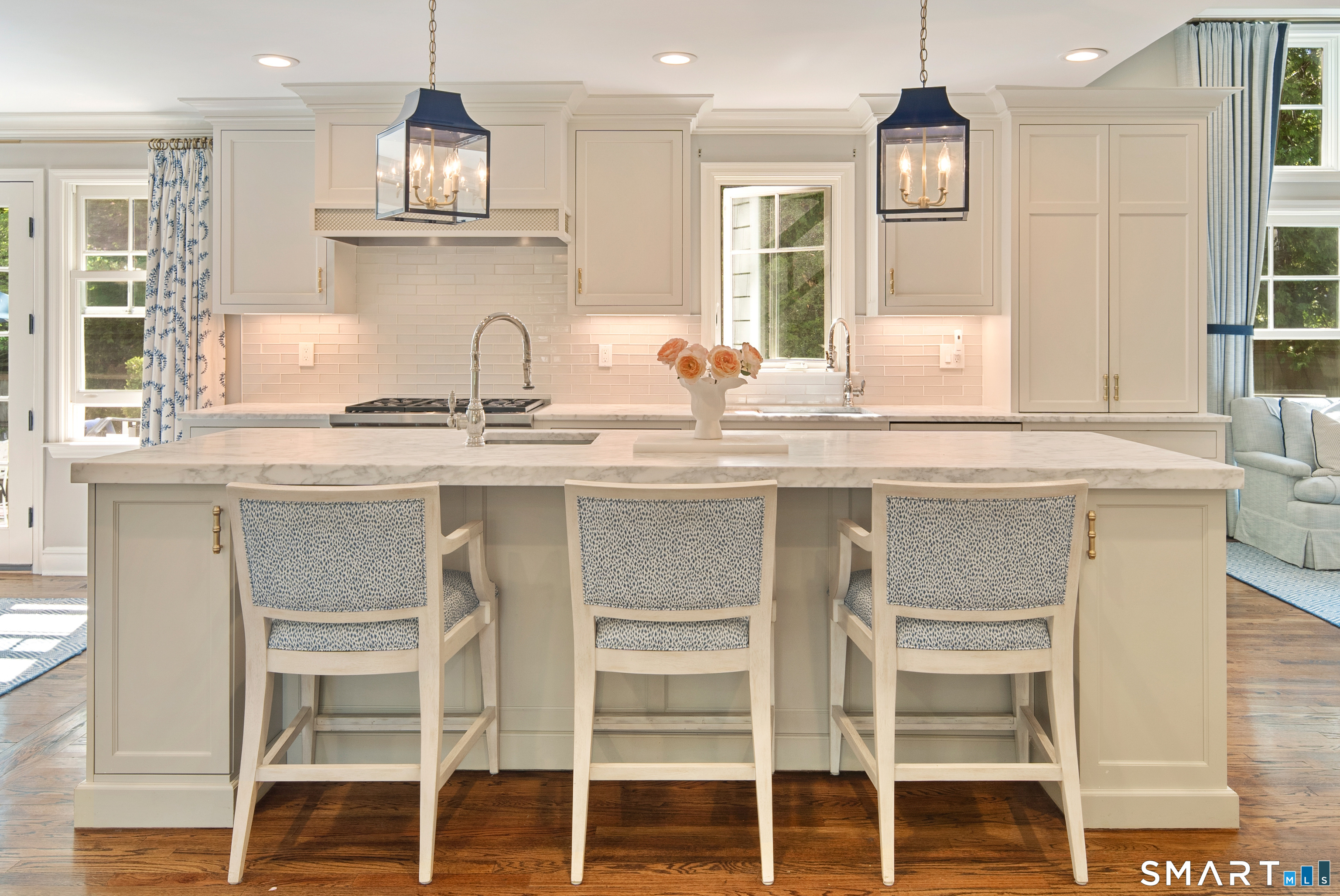 11 McLaren Road South Darien, CT 06820 - Photo 12 of 40 a kitchen with granite countertop cabinets and wooden floor