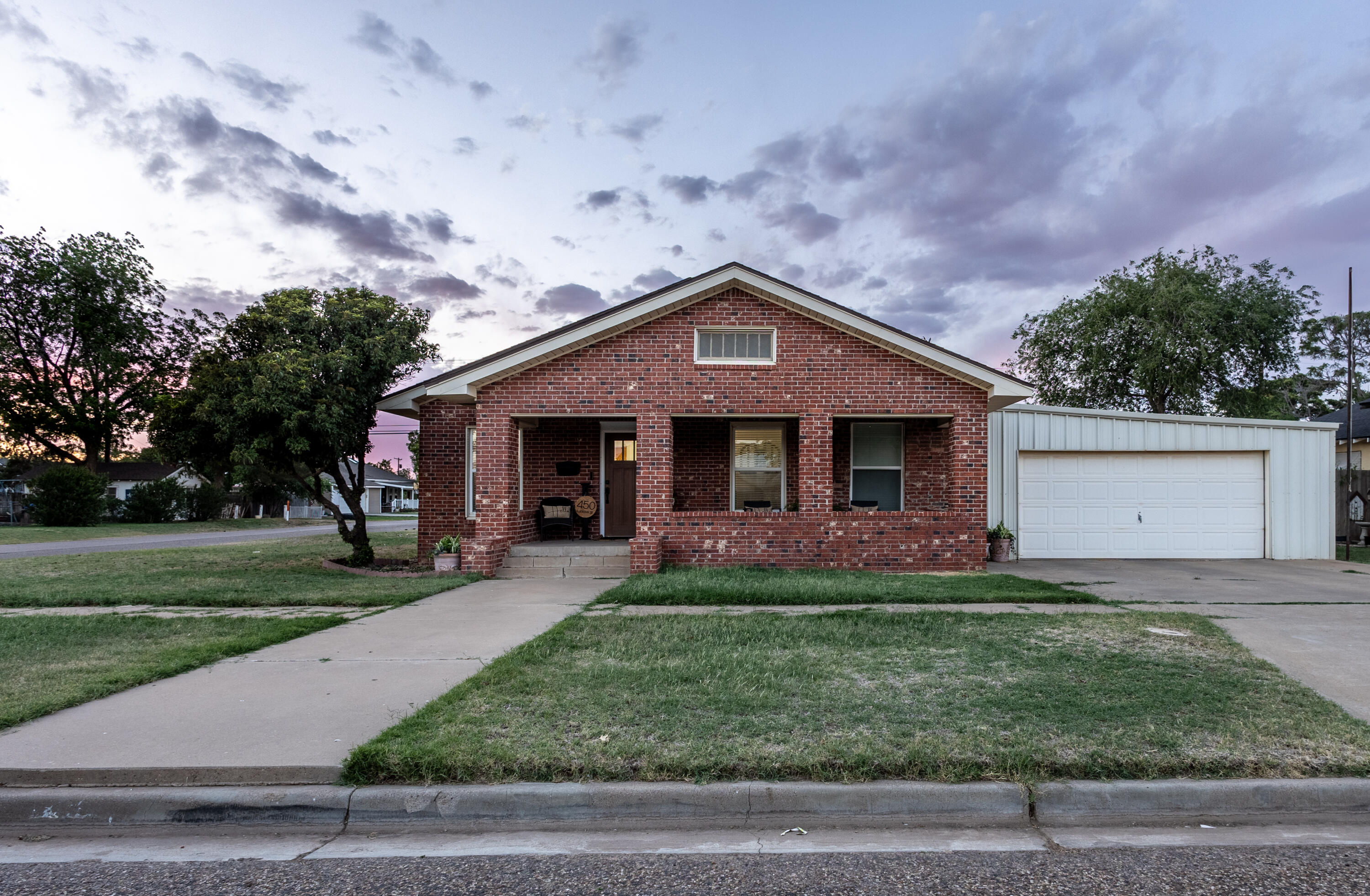 450 West Lubbock Street Slaton, TX 79364 - Photo 1 of 31 ELA_Slaton TX House_2026-2