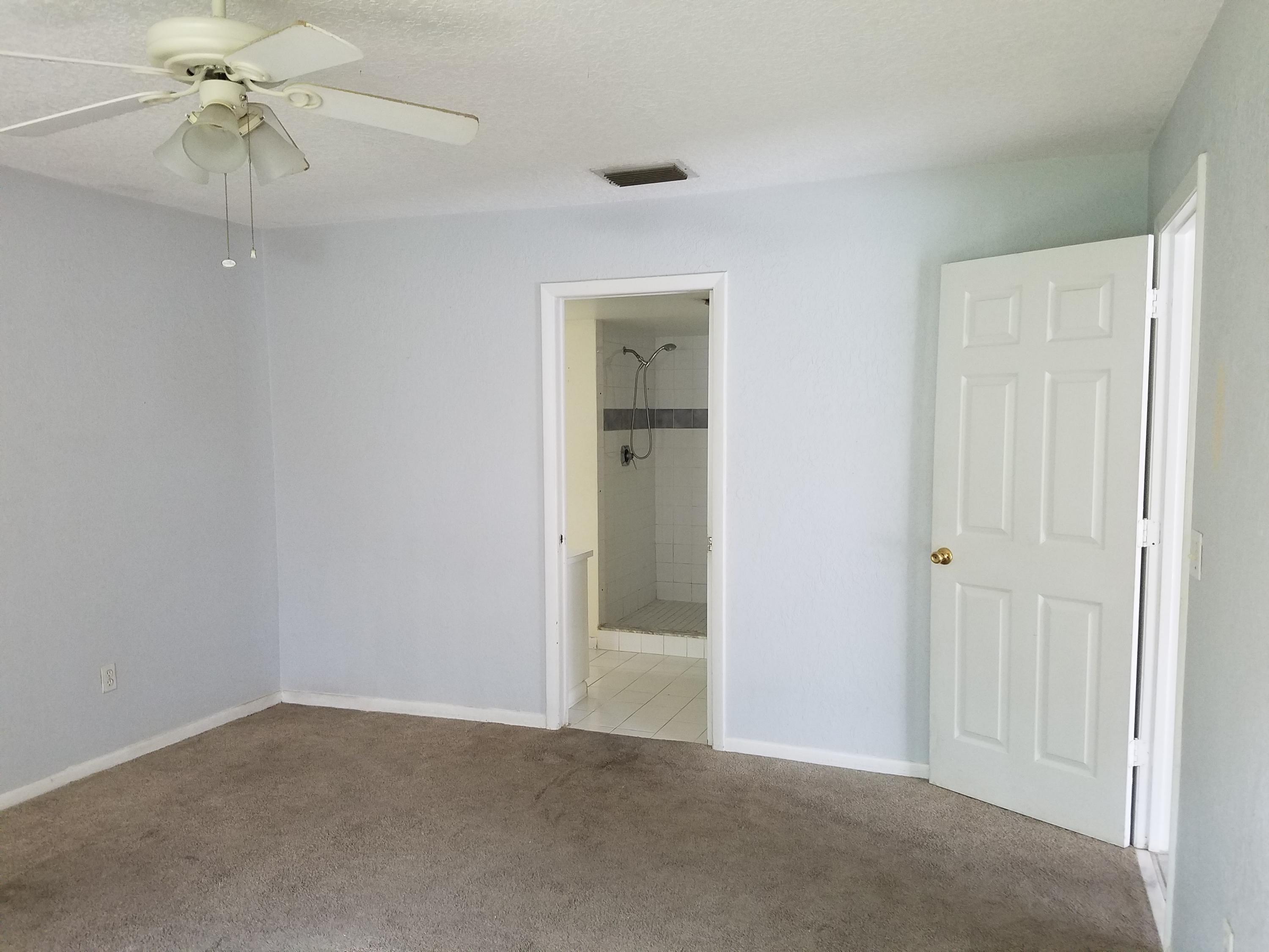 934 Southwest Longfellow Road Port St. Lucie, FL 34953 - Photo 11 of 26 master bedroom