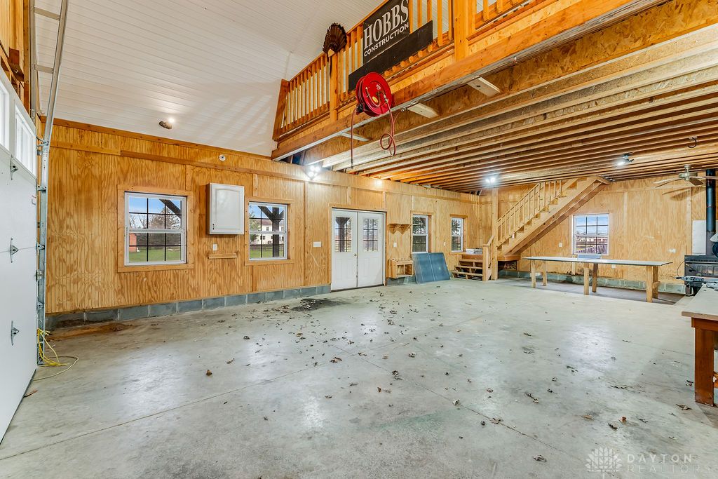 7400 Cook-Jones Road Waynesville, OH 45068 - Photo 63 of 72 This spacious garage features a versatile layout, ready for various projects and storage.