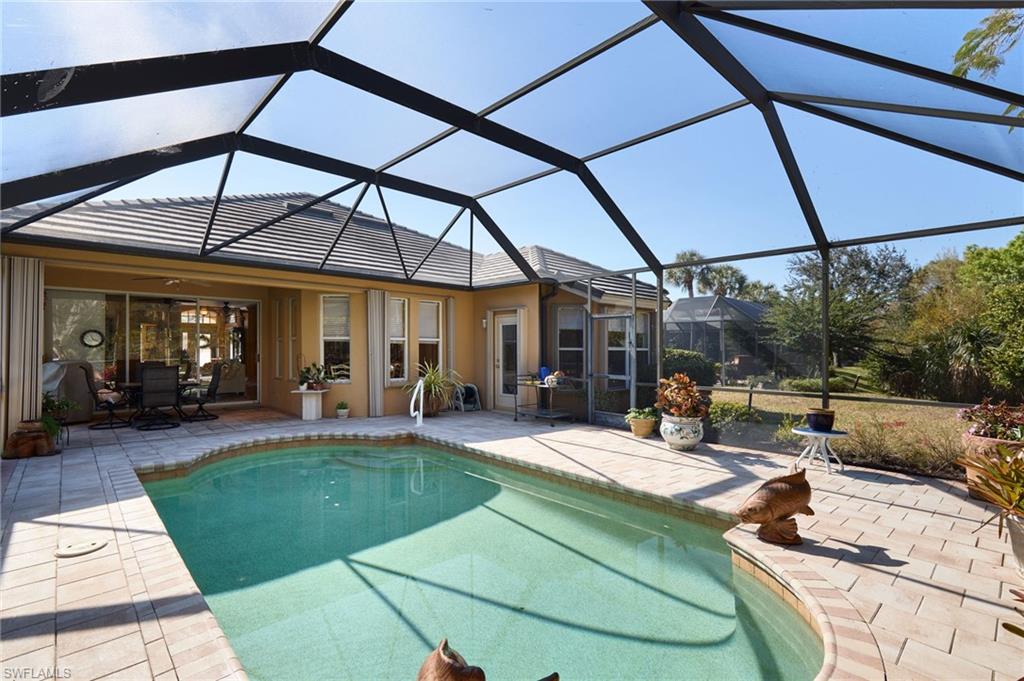 20540 Rookery Drive Estero, FL 33928 - Photo 22 of 32 a view of a backyard with sitting area