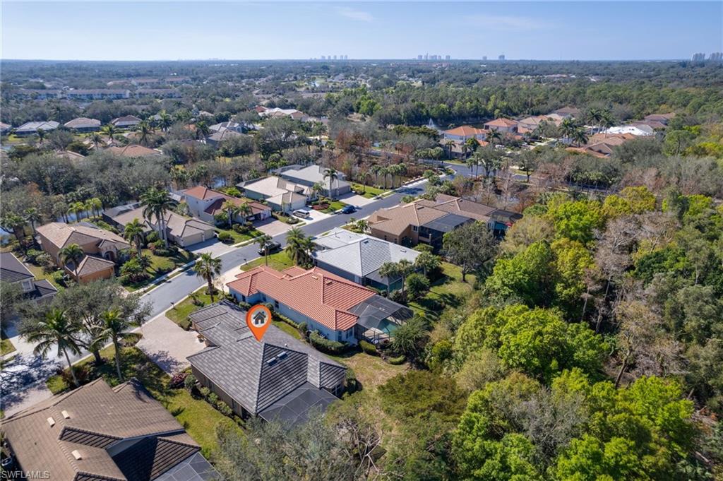 20540 Rookery Drive Estero, FL 33928 - Photo 27 of 32 an aerial view of residential houses with outdoor space