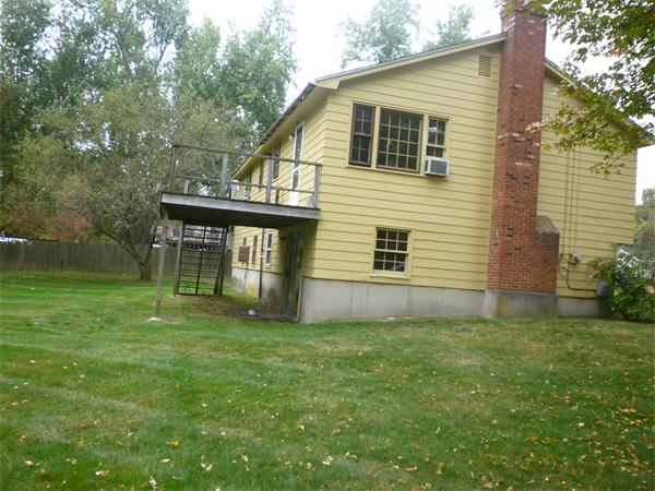 21 Poe Road Billerica, MA 01821 - Photo 4 of 4 a view of a house with a yard