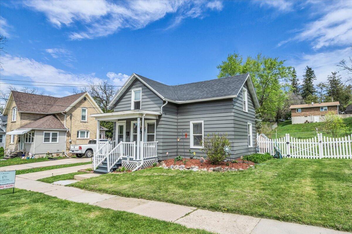 235 East Woolcock Street Jefferson, WI 53549 - Photo 4 of 32 Great curb appeal!