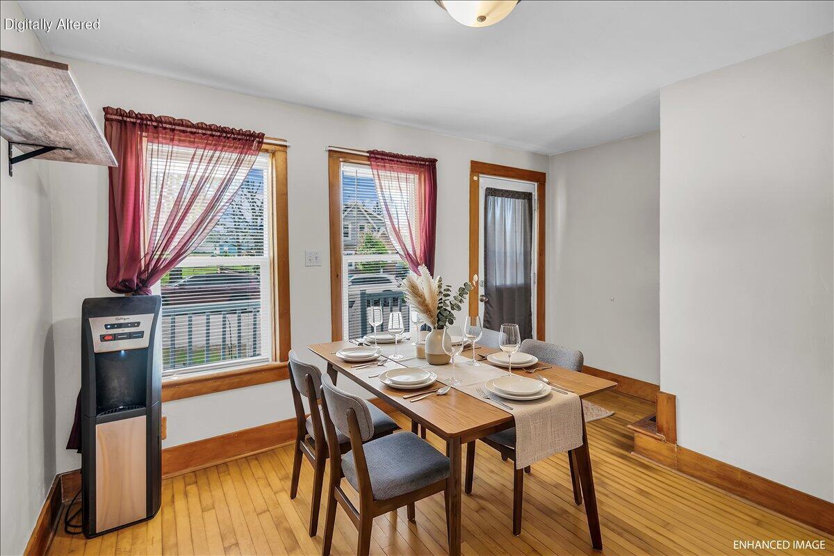 235 East Woolcock Street Jefferson, WI 53549 - Photo 8 of 32 Virtually staged dining room