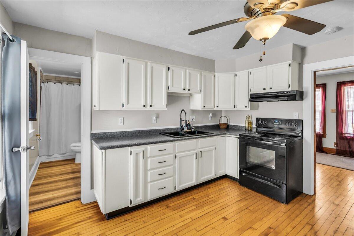 235 East Woolcock Street Jefferson, WI 53549 - Photo 10 of 32 large kitchen with freshly painted cabinets
