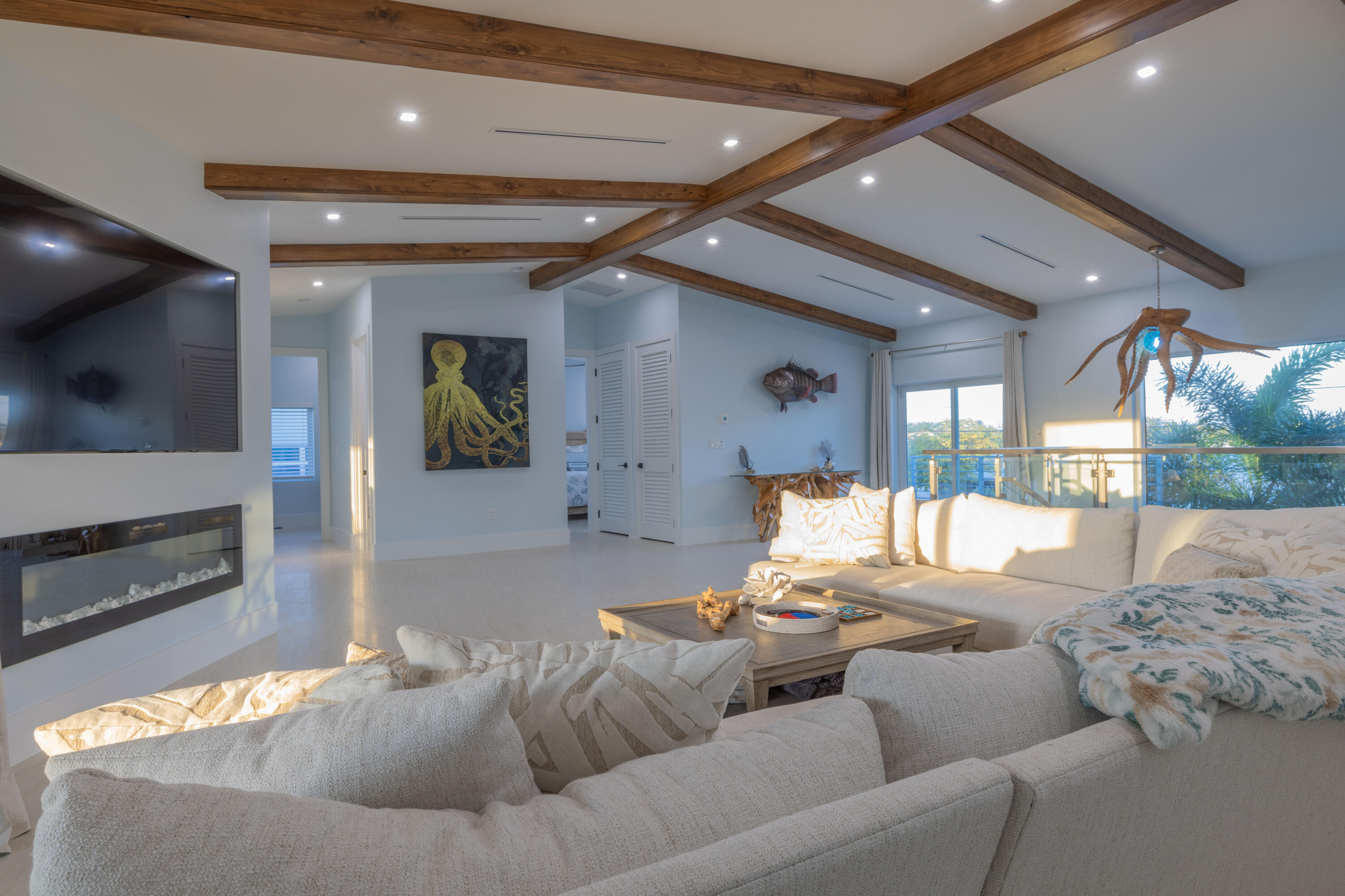 241 12th Street Key Colony Beach, FL 33051 - Photo 39 of 74 a living room with furniture window and a fireplace