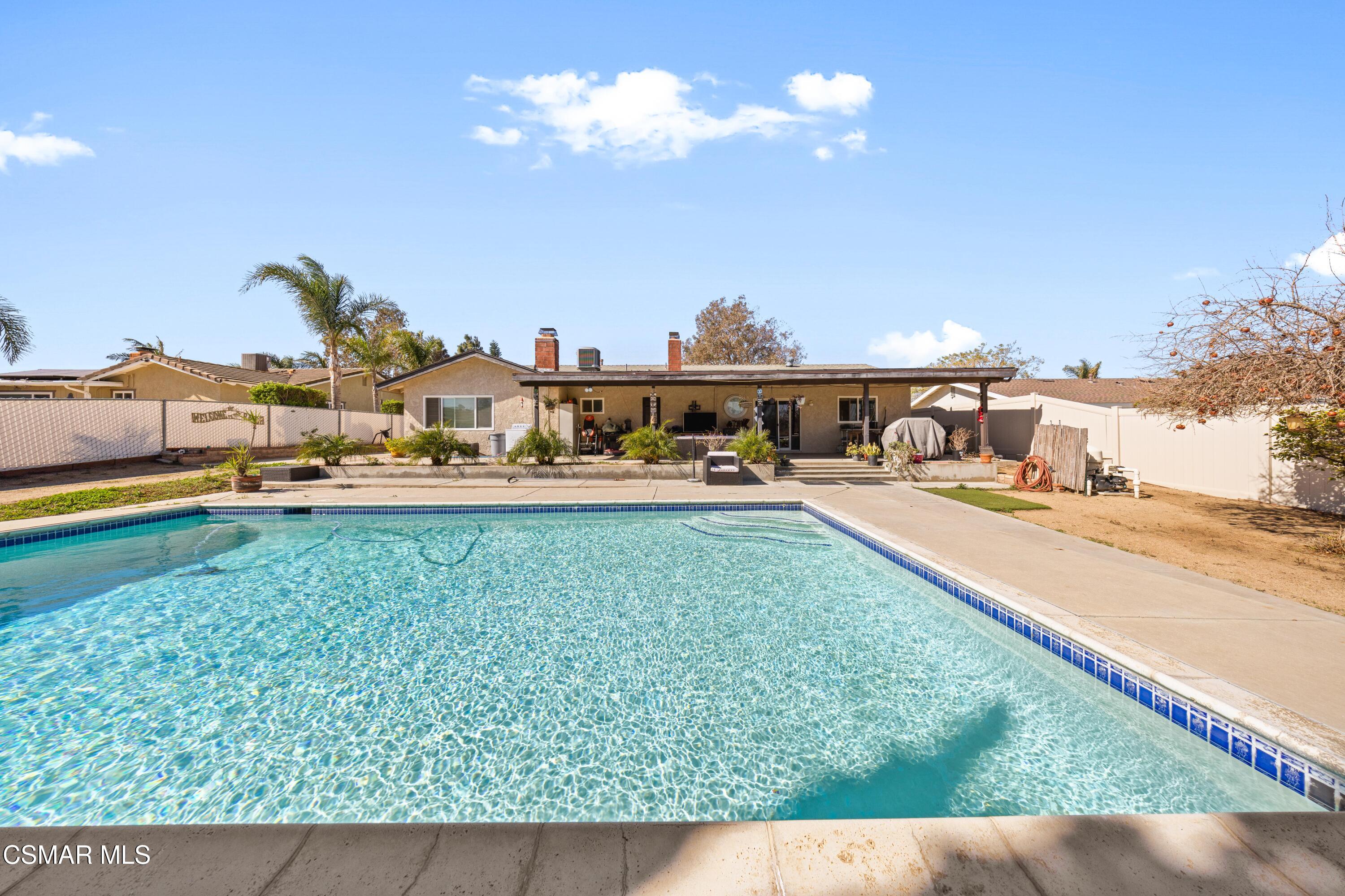 4931 Roundup Road Norco, CA 92860 - Photo 11 of 21 a view of swimming pool with outdoor seating