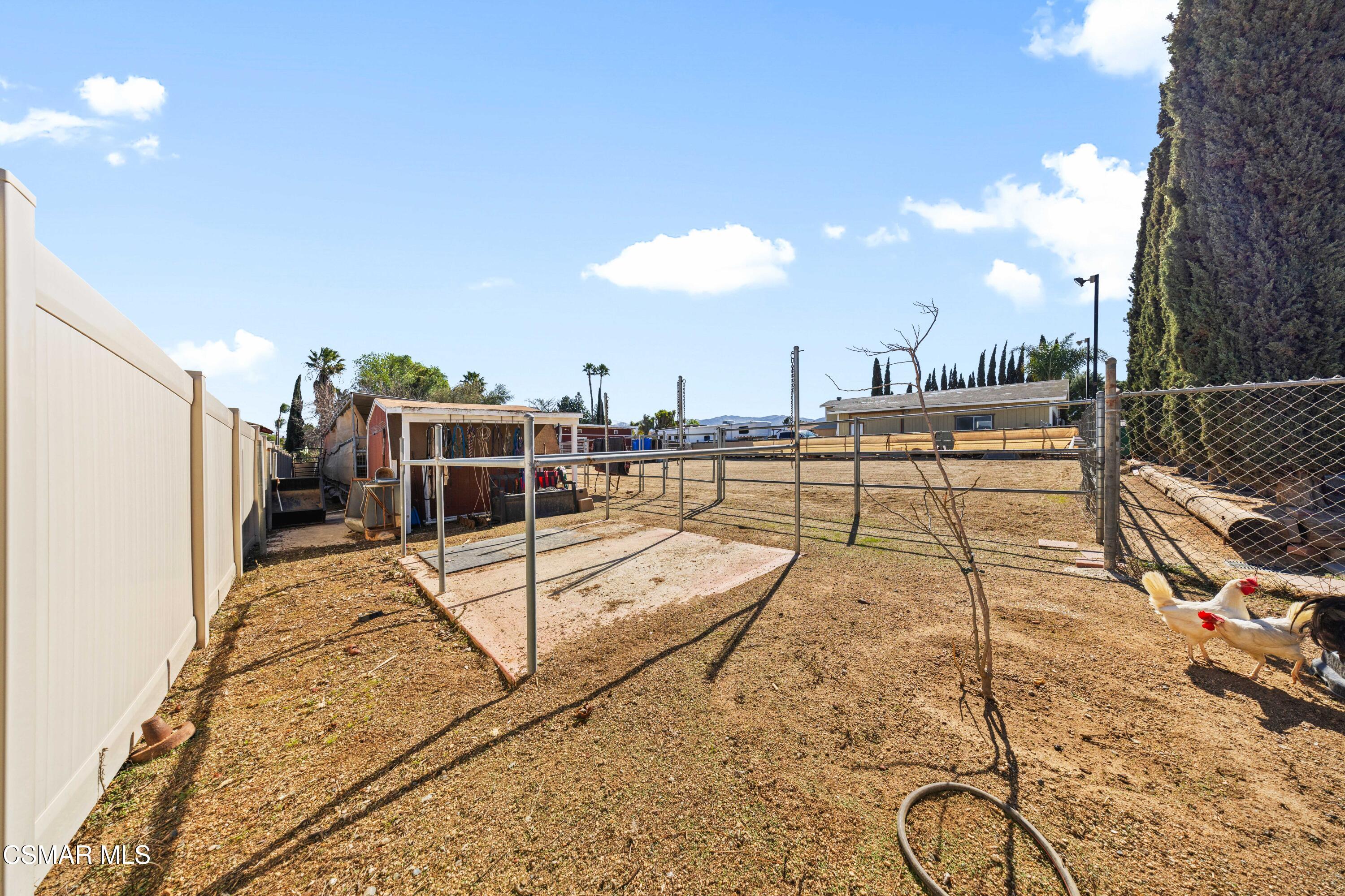 4931 Roundup Road Norco, CA 92860 - Photo 17 of 21 a view of a terrace with chairs