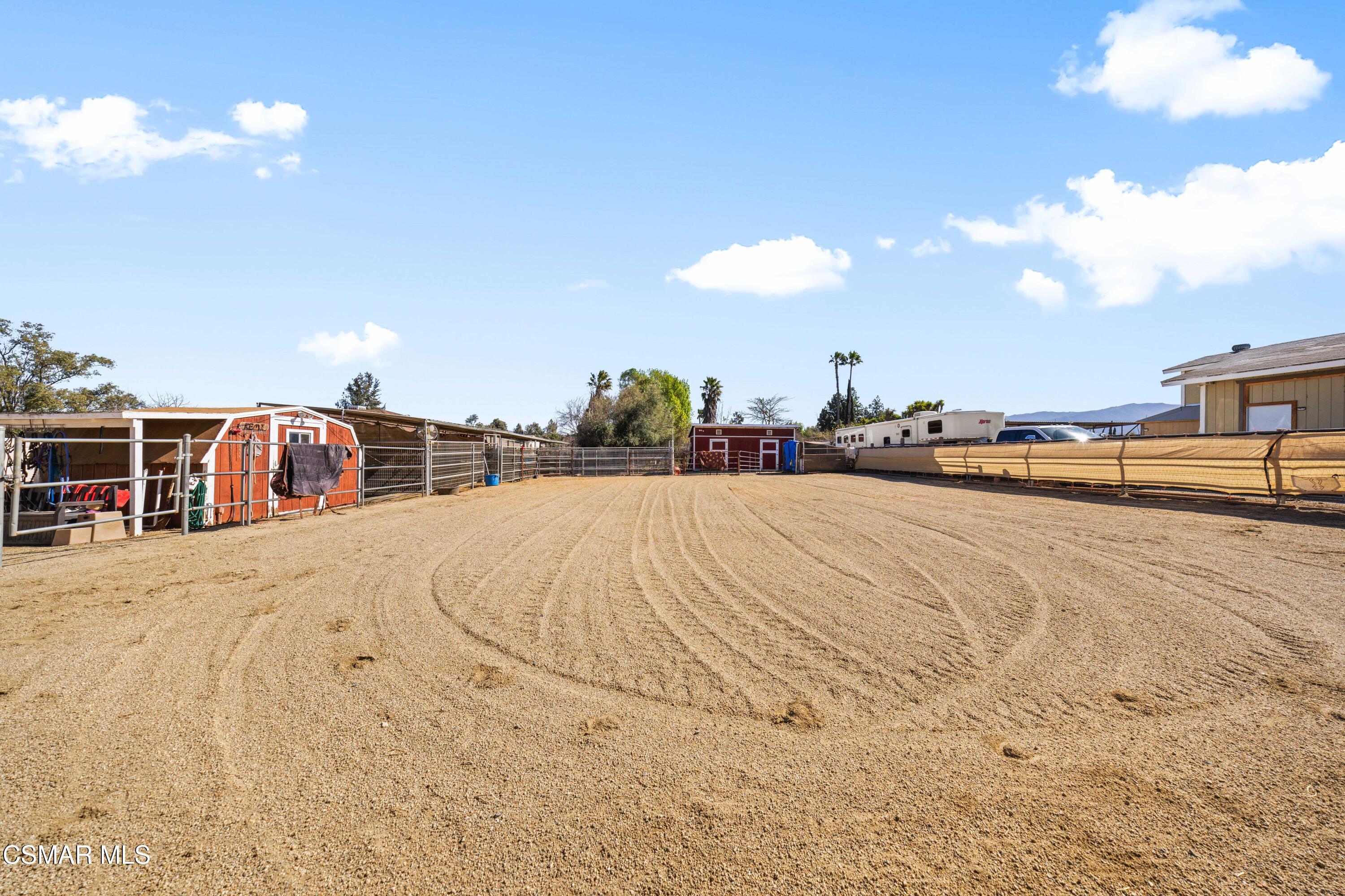 4931 Roundup Road Norco, CA 92860 - Photo 19 of 21 a view of a swimming pool and an outdoor space