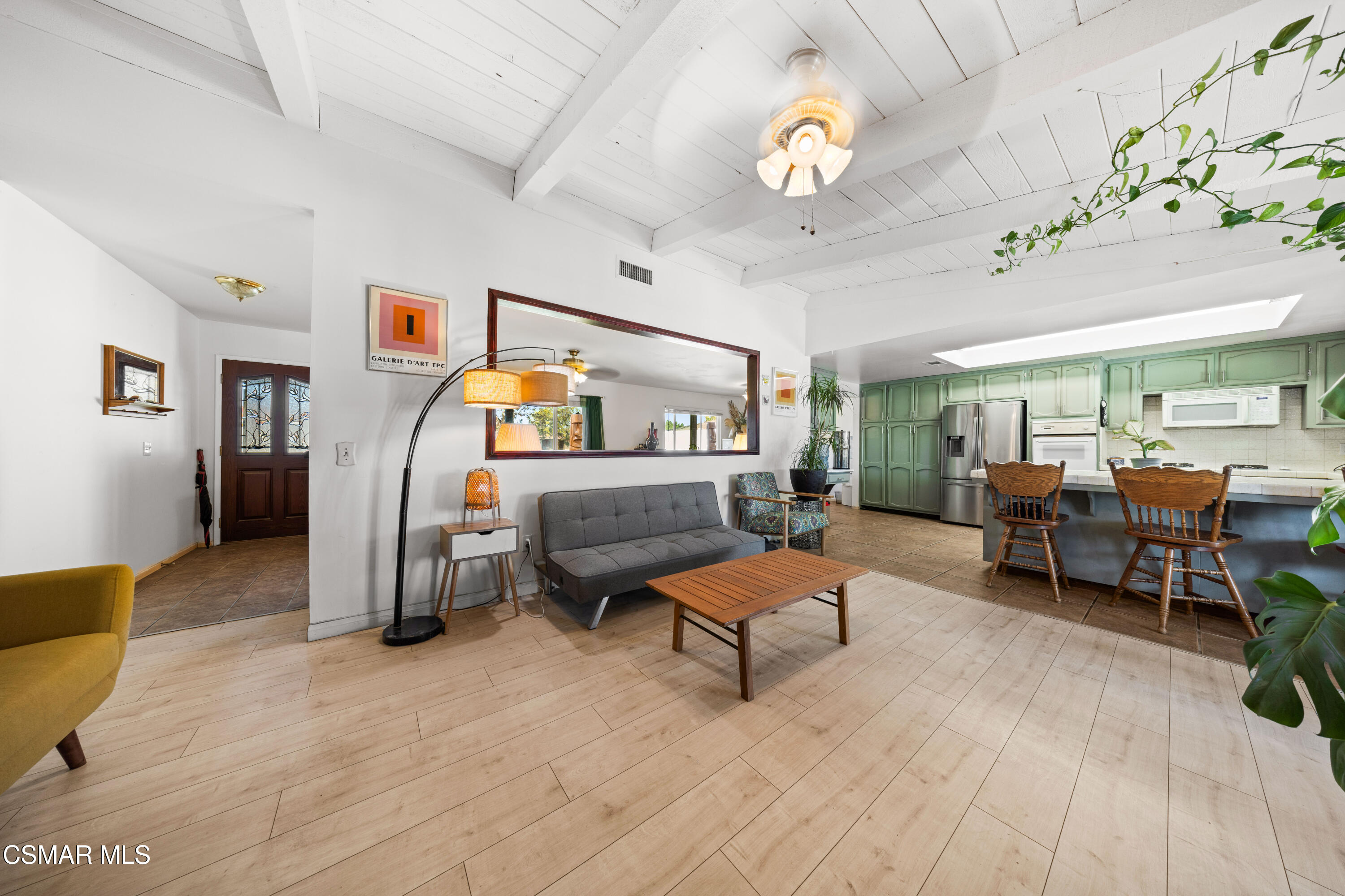 4931 Roundup Road Norco, CA 92860 - Photo 7 of 21 a living room with furniture and a chandelier
