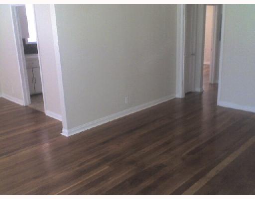 825 Indiana Avenue, Unit 2 Corpus Christi, TX 78404 - Photo 2 of 5 a view of a hallway with wooden floor