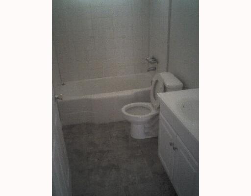 825 Indiana Avenue, Unit 2 Corpus Christi, TX 78404 - Photo 5 of 5 a bath room with a toilet and a bath tub