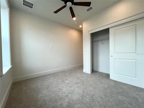 a view of storage and utility room with washer and dryer