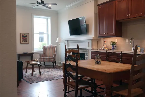 a view of a kitchen with a sink and microwave