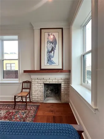 an empty room with a ceiling fan and a ceiling fan