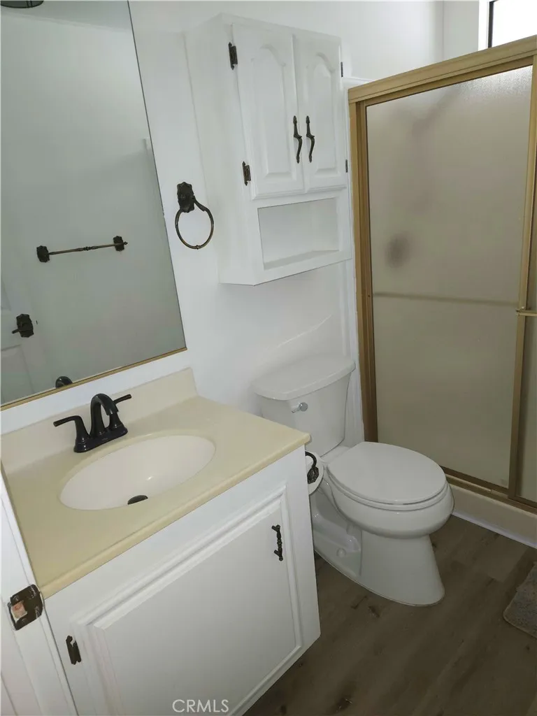 840 Foothill, Unit 203 Azusa, CA 91702 - Photo 11 of 21 a bathroom with a sink a toilet and shower