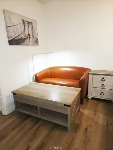 a bedroom with a bed and lamp