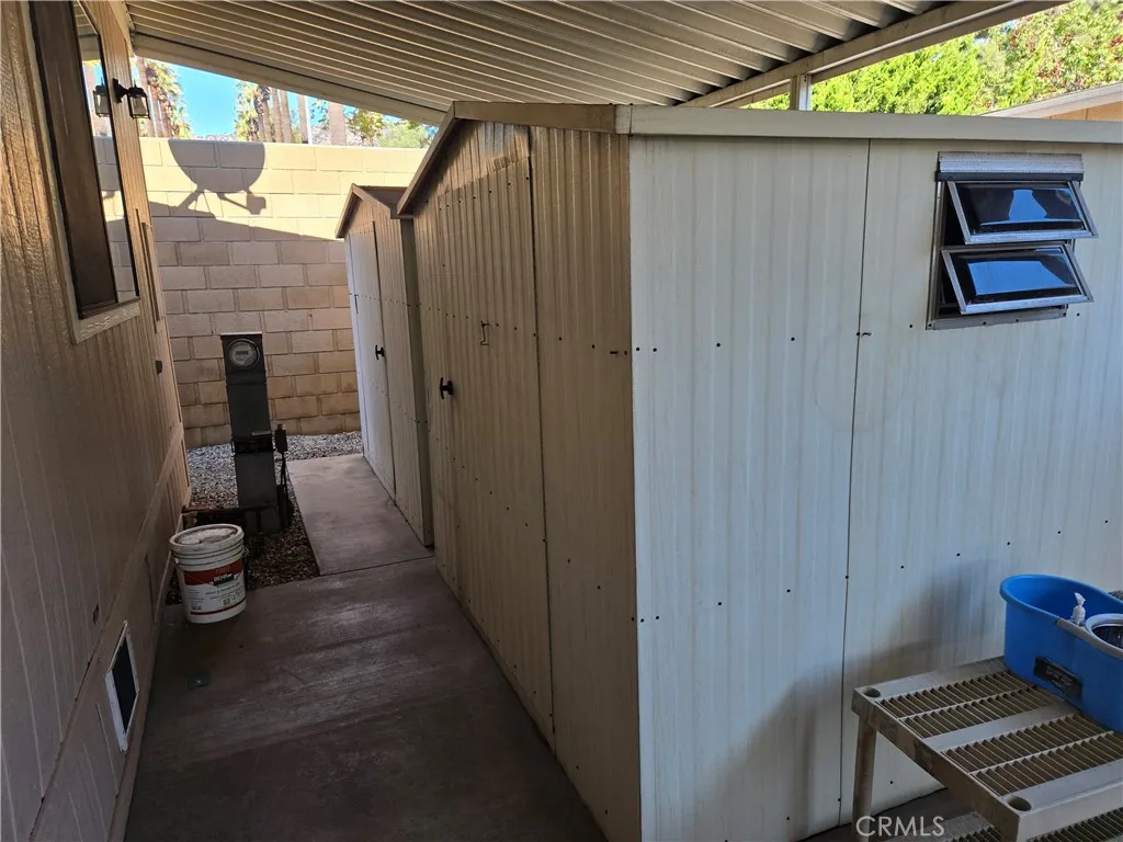 840 Foothill, Unit 203 Azusa, CA 91702 - Photo 21 of 21 a view of a door and chair in a patio