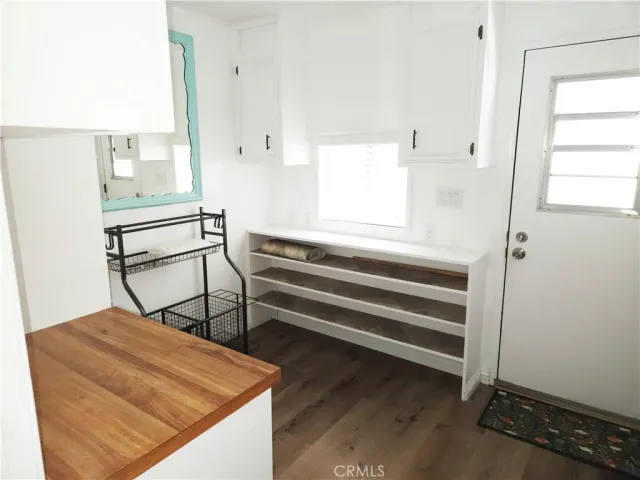 a room with stairs and a window