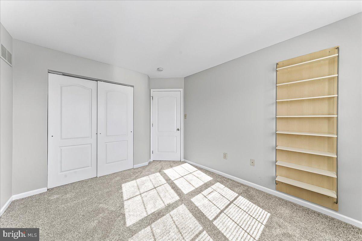 103 Bonnybrook Road Middletown, DE 19709 - Photo 13 of 32 a view of an empty room and a window