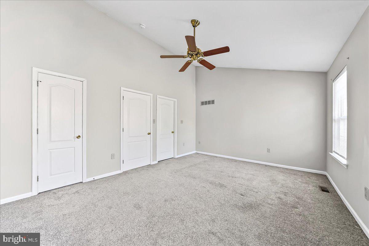 103 Bonnybrook Road Middletown, DE 19709 - Photo 19 of 32 an empty room with windows and fan
