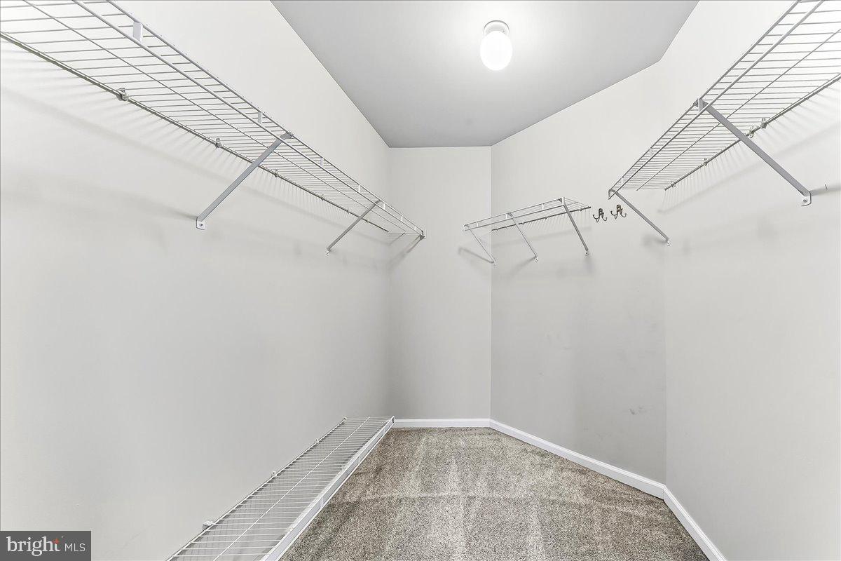 103 Bonnybrook Road Middletown, DE 19709 - Photo 20 of 32 a view of a room with racks on the wall