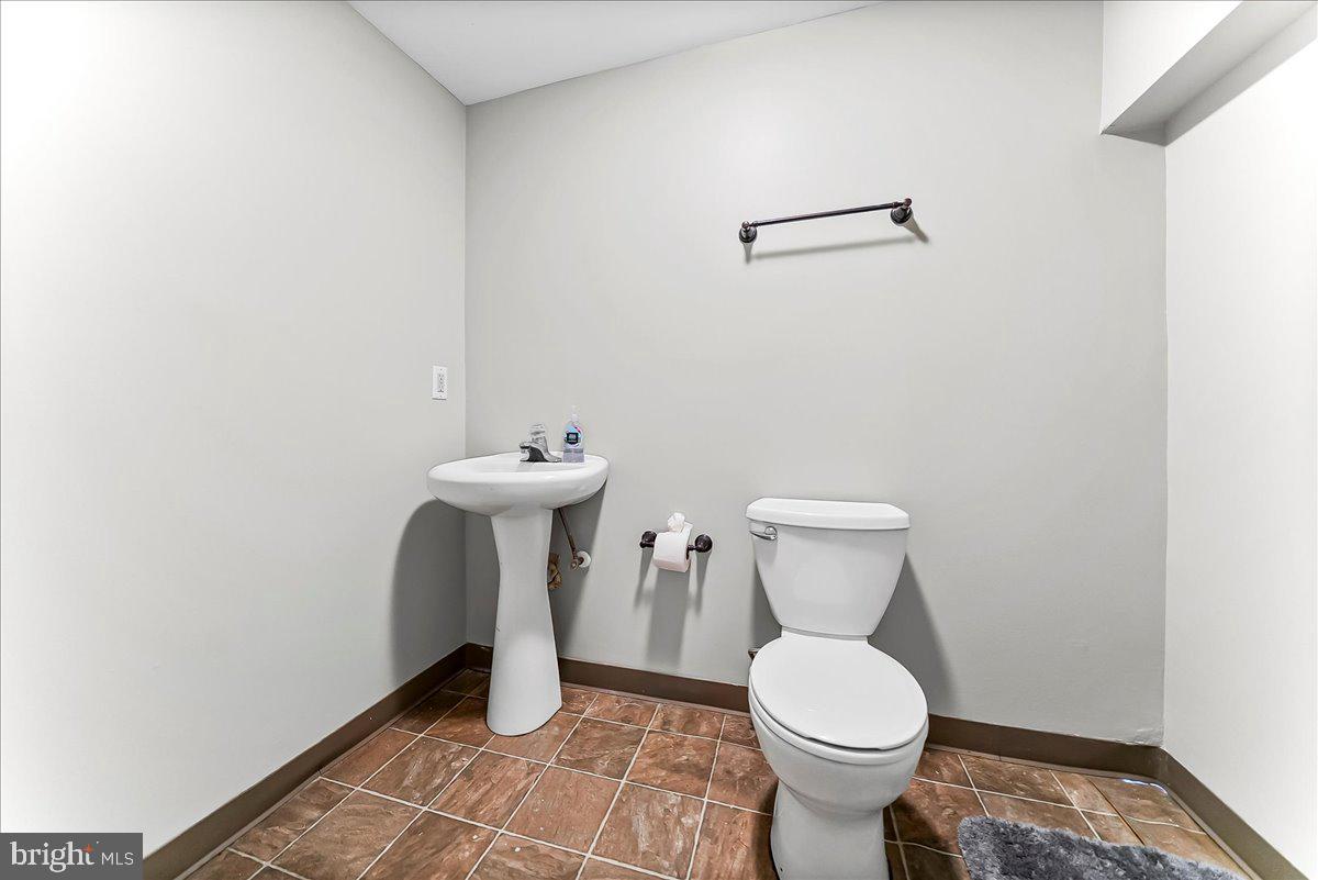 103 Bonnybrook Road Middletown, DE 19709 - Photo 24 of 32 a bathroom with a toilet and a sink