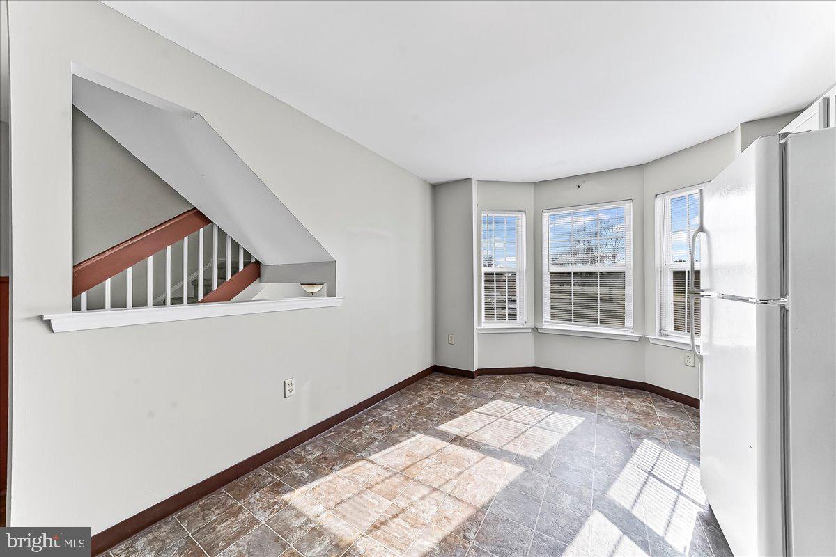 103 Bonnybrook Road Middletown, DE 19709 - Photo 8 of 32 a view of an empty room with a window