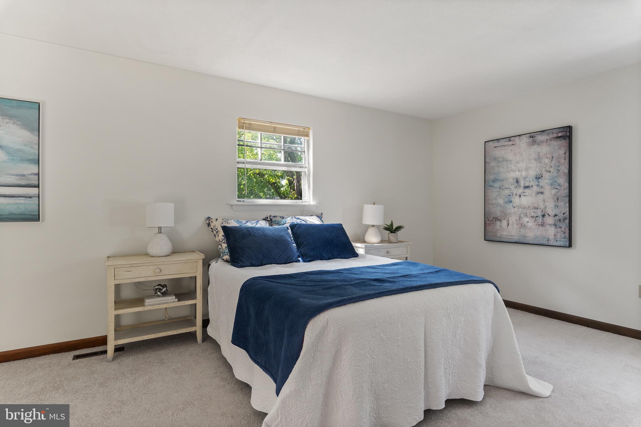 534 Londontown Road Edgewater, MD 21037 - Photo 19 of 59 a bedroom with a bed and a window
