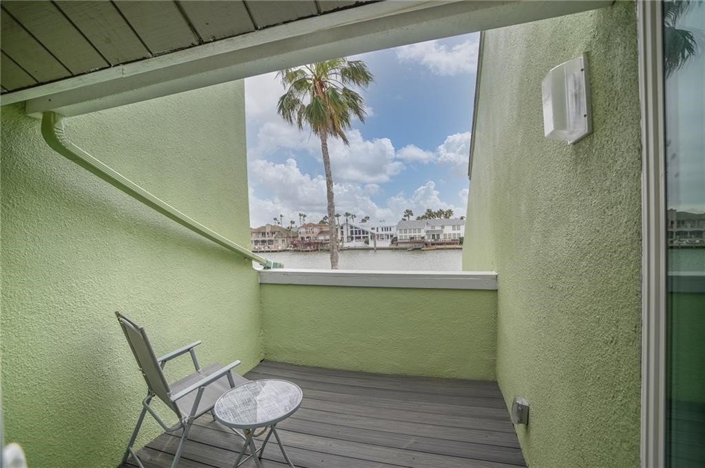 14300 Aloha Street, Unit 231 Corpus Christi, TX 78418 - Photo 22 of 37 a view of a room that has a table and chair