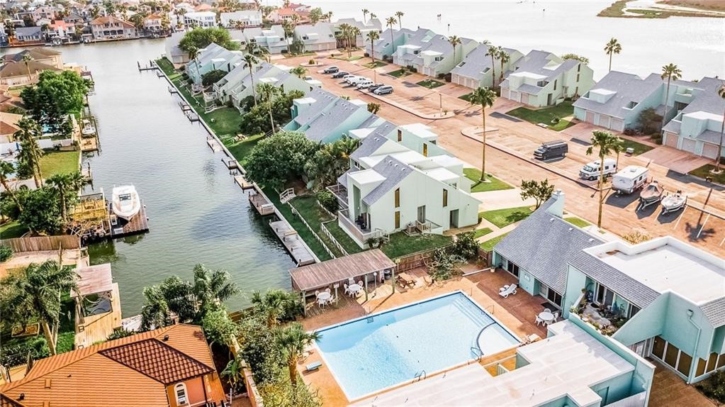 14300 Aloha Street, Unit 231 Corpus Christi, TX 78418 - Photo 35 of 37 an aerial view of a house with outdoor space and lake view