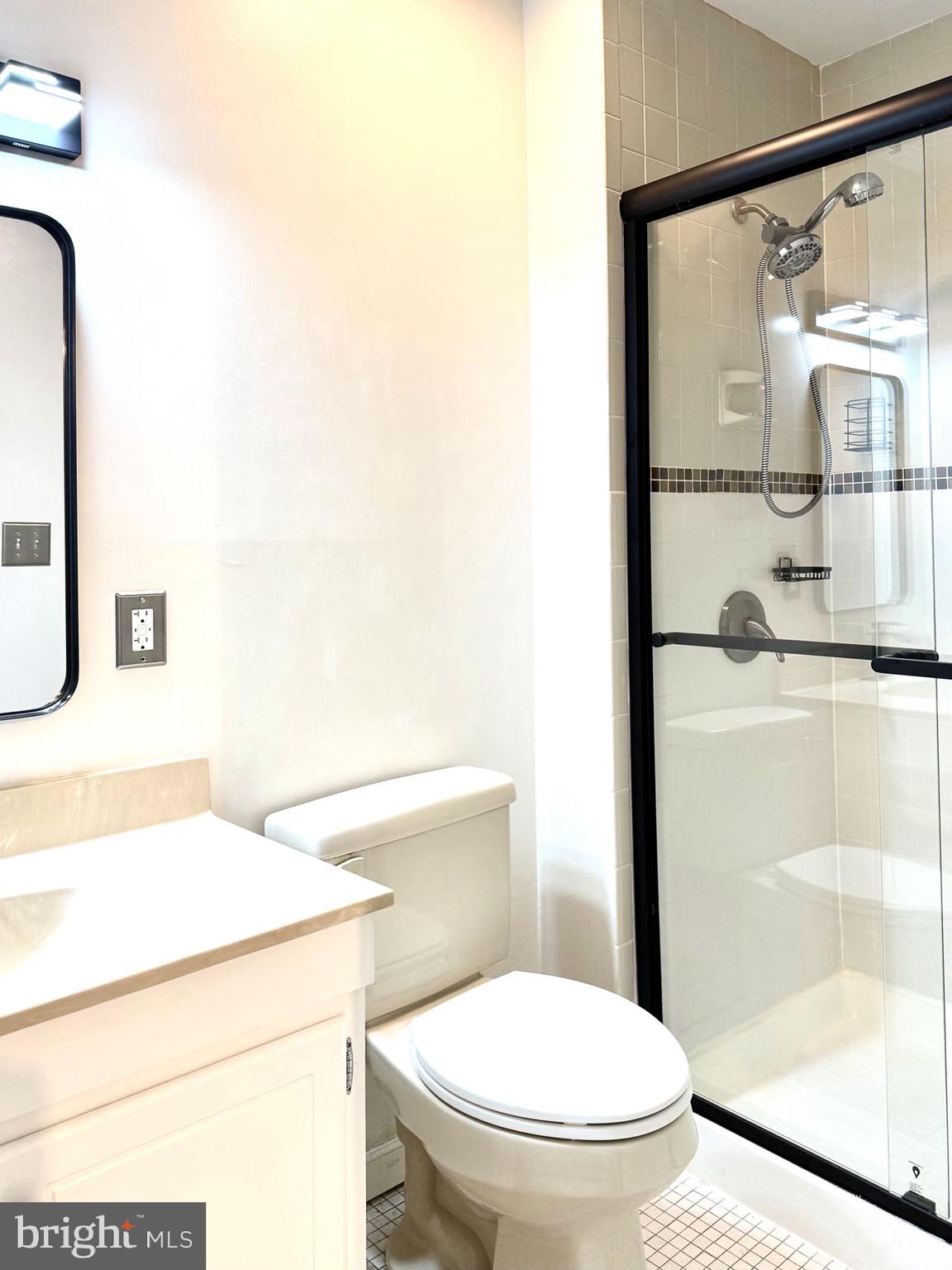 532 Riviera Drive, Unit 532B Joppa, MD 21085 - Photo 30 of 43 a white toilet sitting next to a bathroom sink