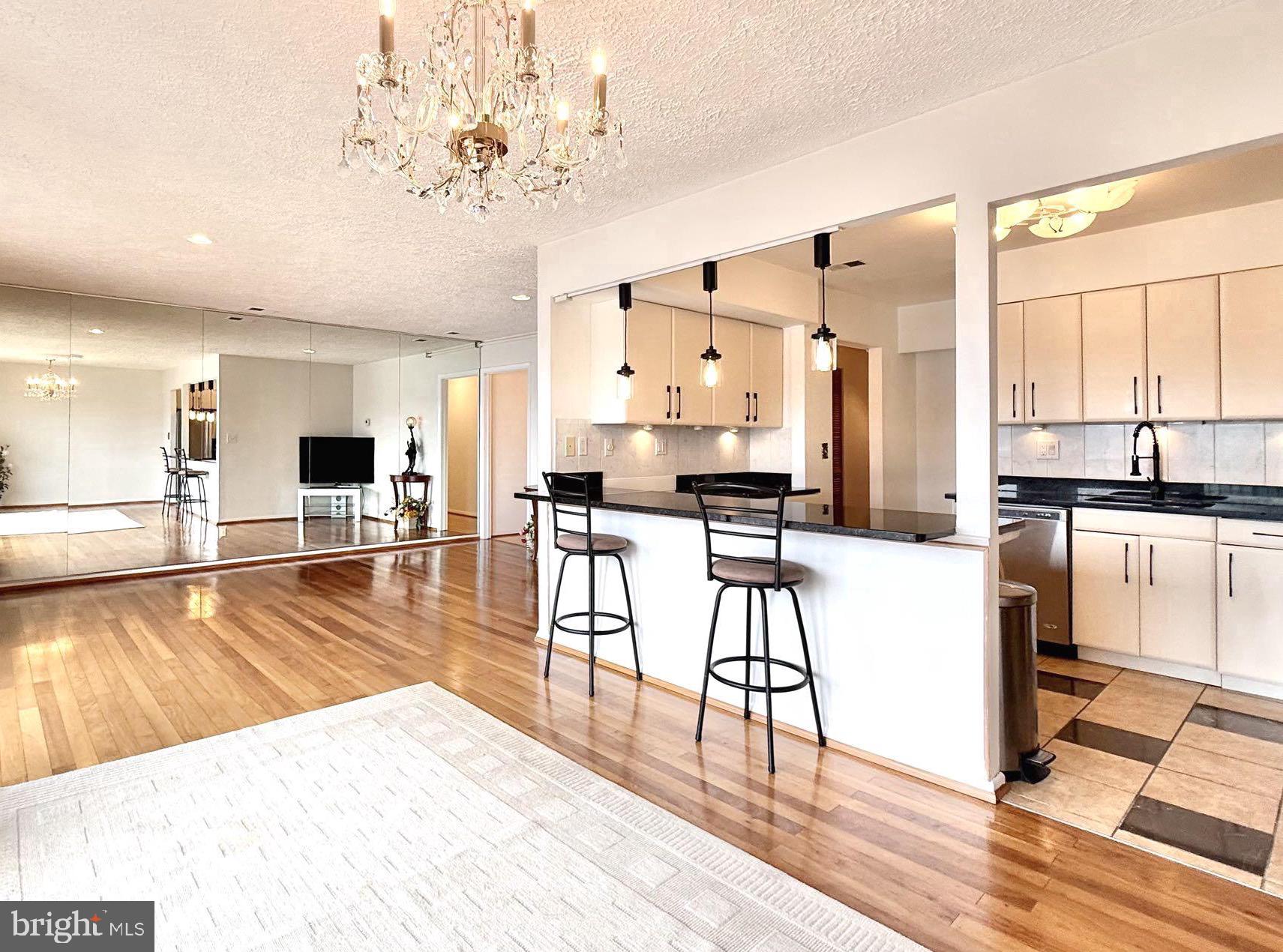 532 Riviera Drive, Unit 532B Joppa, MD 21085 - Photo 3 of 43 a living room with stainless steel appliances kitchen island granite countertop furniture and a view of kitchen