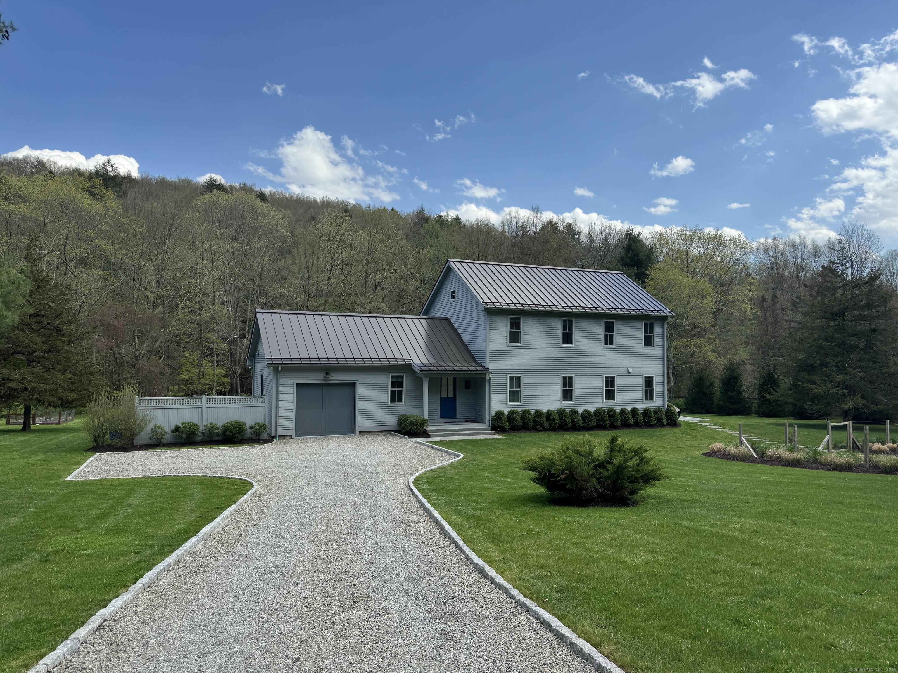 a view of house with garden