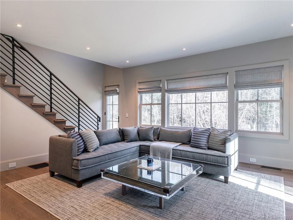 126 River Road Washington, CT 06794 - Photo 15 of 32 a living room with furniture and a window