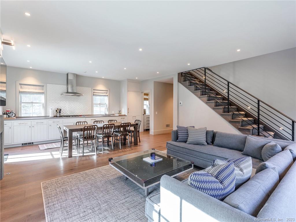 126 River Road Washington, CT 06794 - Photo 16 of 32 a living room with furniture and a table