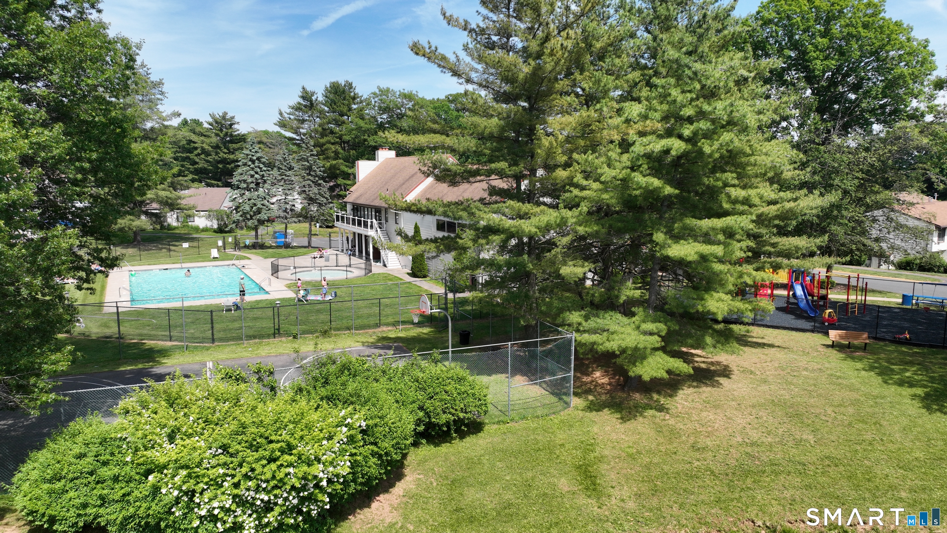 94 Cottonwood Road, Unit 94 Newington, CT 06111 - Photo 33 of 33 Community club house, pool, hot tub, tennis court, pond, playground for kids.